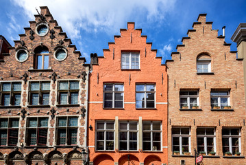 Naklejka premium Brugge medieval historic city. Streets and historic center, canals and buildings. Brugge popular touristic destination of Belgium.