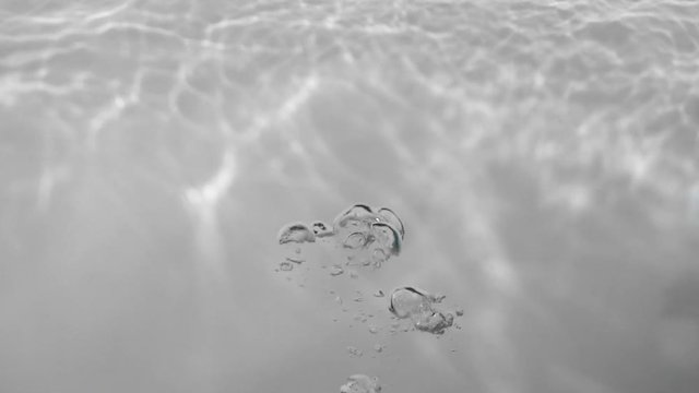 Bubbles in a pool with white background