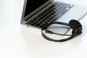 headset and computer laptop, call center support
