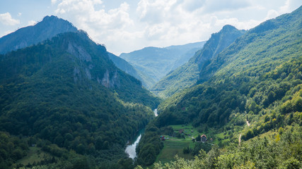 Fototapeta premium View on Tara river canyon in a cloudy day, mountains around, Montenegro
