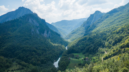 View on Tara river canyon in a cloudy day, mountains around, Montenegro