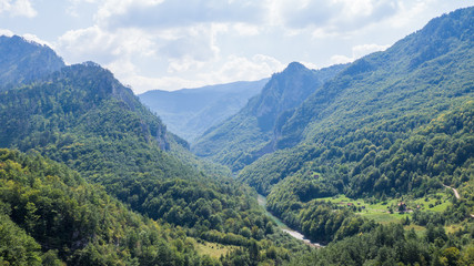 View on Tara river canyon in a cloudy day, mountains around, Montenegro