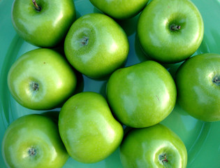 diet for a beautiful figure. dietary food. diet. recipe of health. strong teeth and gum. green apples on a plate.