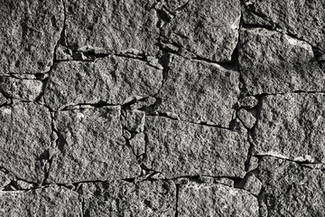 Texture of the black volcanic rock wall from Lanzarote, Canary Islands, Spain.