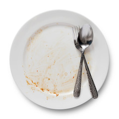 Top view of empty plate, dirty after the meal is finished isolate with clipping path.
