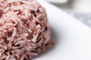 Steamed rice berry in white plate