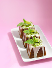 Lemon cakes on the pink background