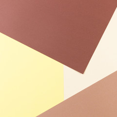 Colorful soft brown, beige and yellow paper background.