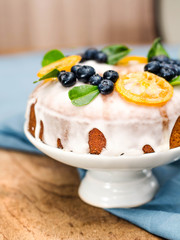 Lemon cakes  with bluberry on the blue background