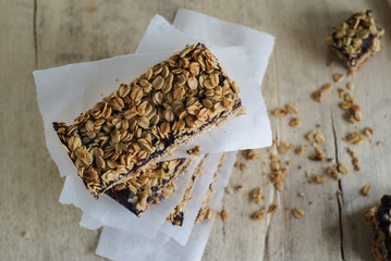 Homemade granola bars on baking parchment
