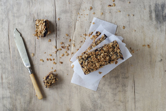 Homemade granola bars on baking parchment