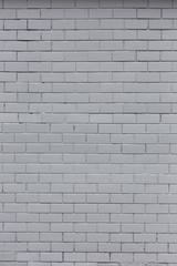 White painted vetrical stone bricks wall pattern texture background
