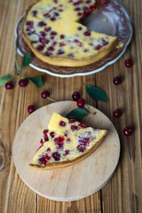 Fototapeta na wymiar Homemade cherry pie on a wooden table
