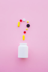 Medical Concept. Colored Pills And Capsule On Pink Background. Pharmacy Theme, Capsule Pills With Medicine Antibiotic in Packages