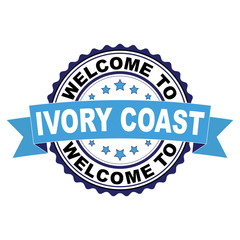 Obraz premium Welcome to Ivory coast blue black rubber stamp illustration vector on white background