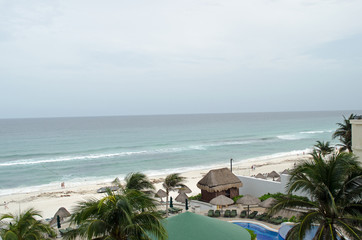 Fototapeta premium Carrabian sea beach with hut coconut trees