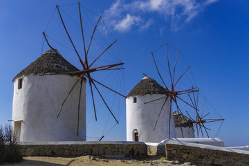 Mykonos, Greece traditional white windmills without crowd. Day view of windmills, the islands...