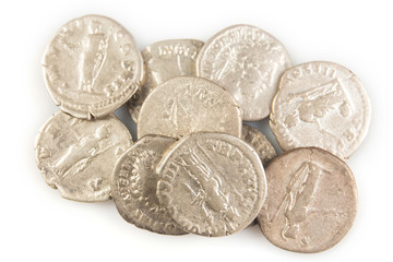 Roman denarius lie on a white background, the era of the Antonines, Marcus Aurelius, Antoninus Pius, Commodus, Caesar