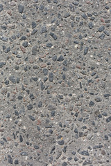 rough concrete surface abstract pattern texture background vertical shot