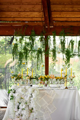 Wedding table decoration. Wedding flowers in yellow