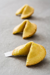 Fortune cookies on gray stone background