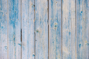 Naklejka premium structure of wooden boards with a blue background