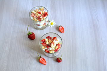 Trifle or dessert with cottage cheese and strawberries. Breakfast