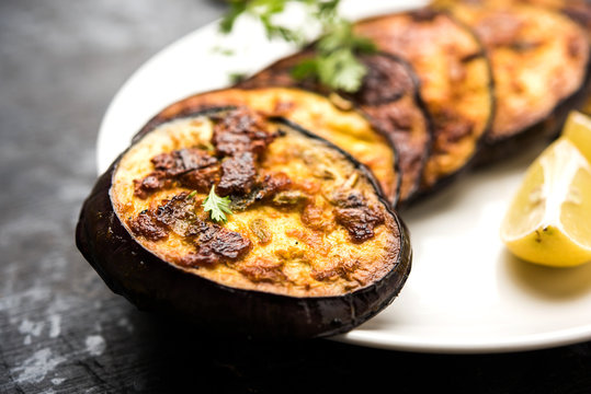 Pan fry crispy baigan / eggplant / brinjal recipe from India. selective focus
