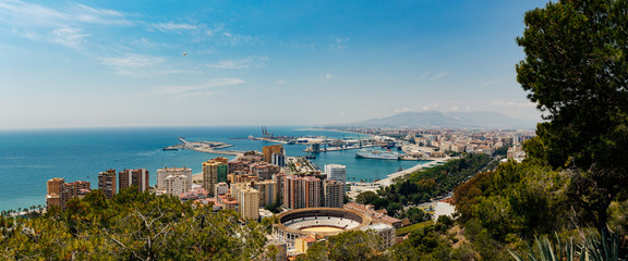 Aerial view of Plaza de toros de La Malagueta and Malaga city, Spain.