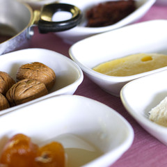 Turkish breakfast. Large walnuts, orange jam, butter