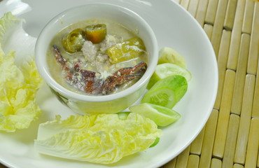 salt crab and minced pork with soy bean sauce dipping fresh vegetable on plate