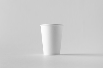 12 oz. white coffee paper cup mock-up without lid.