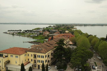 Fototapeta na wymiar The view of Sirmione from Medieval fortress walls, Italy