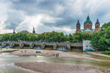 Naklejka premium Munich, Germany June 09, 2018: St. Luke Church near Isar river and Wehrsteg, Munich, Germany