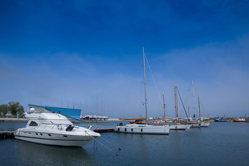 Fototapeta premium Anchored yachts near the pier
