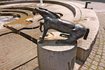 Historic fountain (water clock) in Trier, Germany.