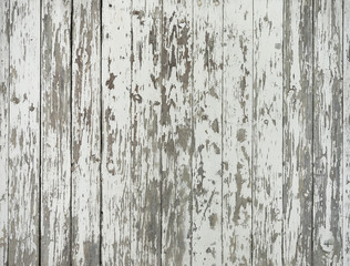 Obraz premium old and grungy vertical wooden planks with peeling white paint