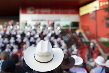 White Cowboy hat at the Calgary Stampede - obrazy, fototapety, plakaty