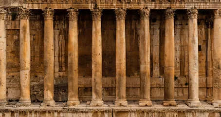 Wall murals Old building Frontal view of a colonnade - Row of columns of an ancient Roman temple ruin (Bacchus temple in Baalbek)