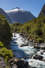 Mountain and stream with crystal clear water on the south island of New Zealand