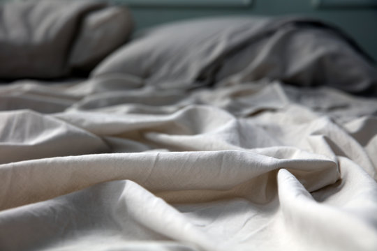 Empty unmade bed