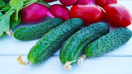 Fresh vegetables on wooden background.