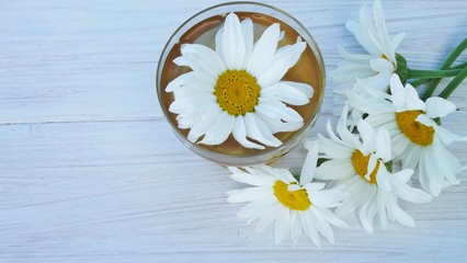 Healthy tea from chamomile flowers.