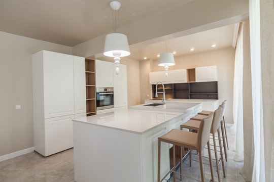 New modern white kitchen. New home. Interior photography
