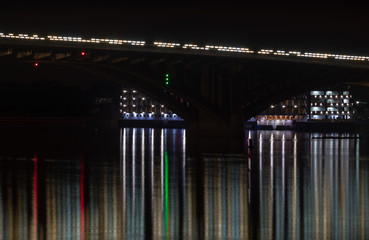 background. defocusing. evening bridge in the lights of the lanterns