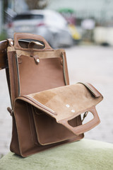 Men casual accessory: Light brown leather suitcase bag