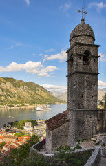 Fototapeta na wymiar Church of Our Leady of Remedy in Kotor.Montenegro.View from the ramparts of the bay and the old town and cruise liner