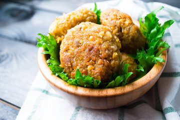 Fried chickpea falafel and leaves of green salad