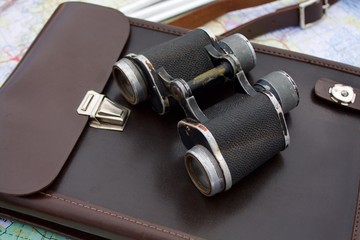 binoculars lying on the officer's bag