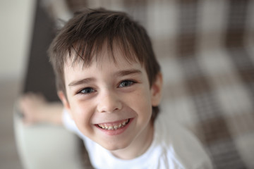 portrait boy child brunette with gray eyes, child